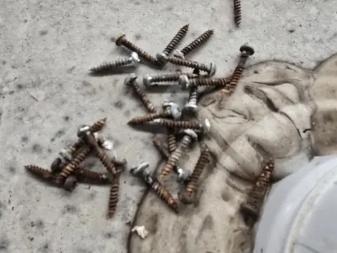 Here is screws that held the skylight down Zoom in on them Zoom in on them you will notice that they're rusting And yes they had butyl tape underneath the skylight so why did this occur Think about that